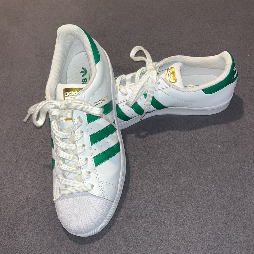 White and green Adidas superstar sneakers, worn once! Size women’s 9.5